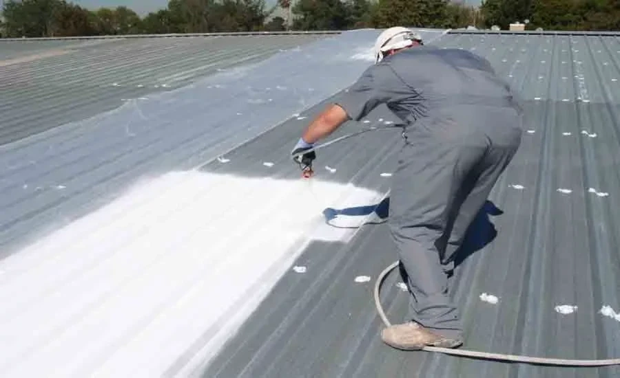 Acrylic roof coating on commercial building